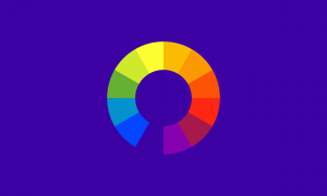 Um fundo índigo com uma roda de cores em seu centro. A cor índigo cria um espaço na roda de cores.